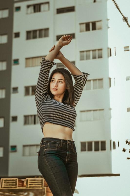 A person standing in front of a building
AI-generated content may be incorrect.