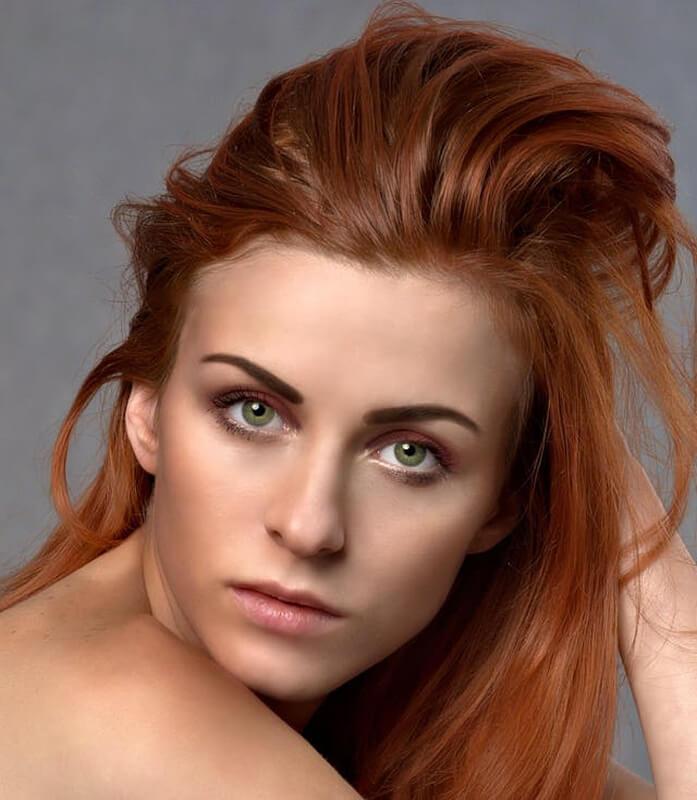 A person with red hair
AI-generated content may be incorrect.