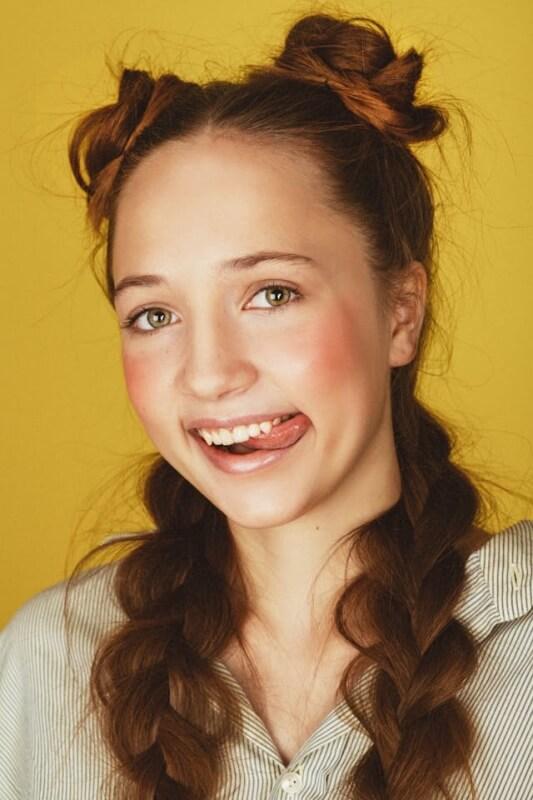A person with her tongue out
AI-generated content may be incorrect.